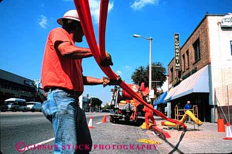 Stock Photo #2674: keywords -  angeles build business california career check communication conduit employee fiber horz income industry install job labor los man not occupation optic orange pay plastic profession released skill technician tube underground utility vocation work