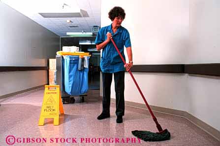 Stock Photo #2676: keywords -  business career check clean cleaning cleans custodian custodians danger employee floor horz hospital income insitution janitor job labor mop mopping mops occupation pay profession released sanitary school sign skill vocation warning wash wet wipe wipes wiping woman work