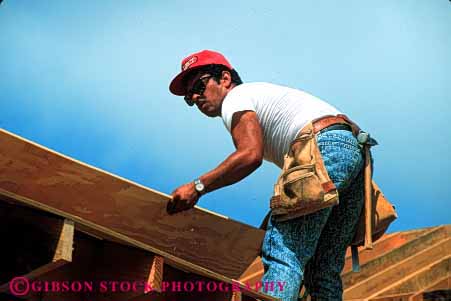 Stock Photo #2677: keywords -  build business career carpenter check construction employee ethnic frame hispanic home horz house income industry job labor man minority new occupation pay profession released skill technician vocation wood work