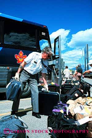 Stock Photo #2691: keywords -  baggage bus business career check driver employee group heavy income injury job labor lift move not occupation pay profession released skill strain suitcase tour travel vert vocation work