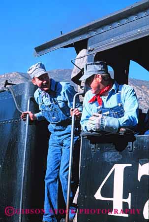 Stock Photo #2692: keywords -  business career check drive employee engineers income industry job labor locomotive not occupation pay profession railroad released skill smile technician train transportation uniform vert vocation work