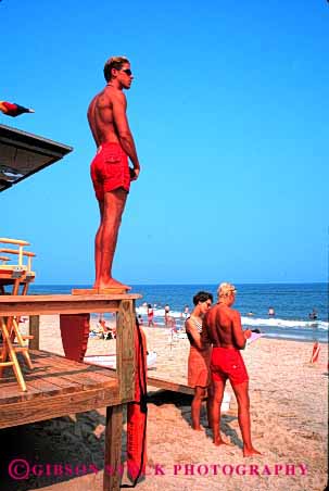 Stock Photo #2694: keywords -  bathing beach business career check chincoteague control employee fit income job labor life lifeguard lifeguards men monitor observe occupation ocean pay physical profession red released sand save skill suit summer sunshine supervise swim tan vert virginia vocation watch work young