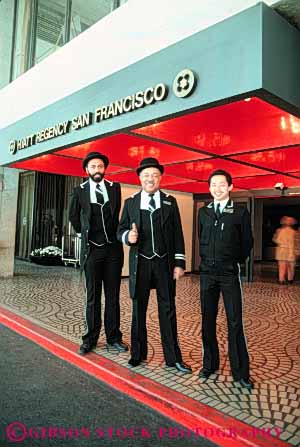 Stock Photo #6124: keywords - african american asian assist black career cheer cheerful doormen entrance ethnic greet help hotel income job lobby male men minority occupation race service smile smiles three vert vocation work workers