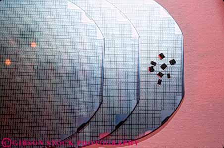 Stock Photo #11085: keywords -  chip chips closeup communications component computer computers computing detail disks equipment high horz industry little micro modern new part parts row semiconductor semiconductors silicon small technology tiny wafer
