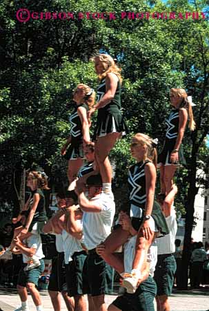 Stock Photo #2733: keywords - acrobat acrobatic acrobatics acrobats balance balanced balances balancing cheerleader collage cooperate cooperation coordinate coordinated coordination group lift men not people perform person practice released skill skilled skills strength student tall teamwork vert women