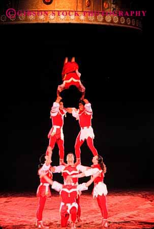 Stock Photo #2740: keywords - acrobat acrobatic acrobatics acrobats balance balanced balances balancing cooperate cooperation coordinate coordinated coordination excalibur group hotel human las lift men nevada not people perform person practice pyramid released skill skilled skills strength tall teamwork vegas vert