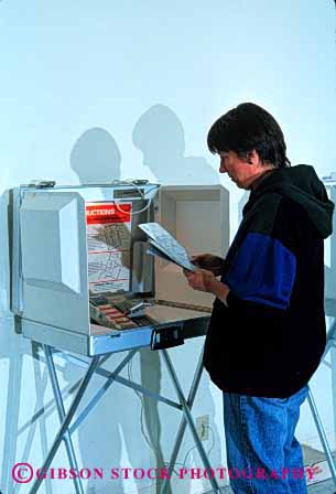 Stock Photo #2745: keywords -  ballot booth confidential democracy democratic elect election government opinion place politics polling portable public released vert vote voting woman