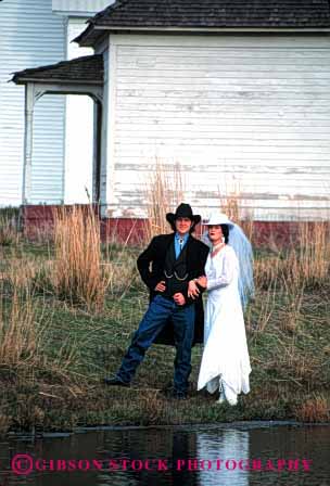 Stock Photo #2752: keywords - affection attire bride celebrate commitment couple family groom husband love man marriage outdoor released share style together vert vow wedding western wife woman