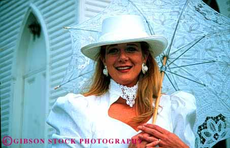 Stock Photo #2760: keywords -  affection bride celebrate commitment family groom horz love marriage parasol released share together vow wife with woman