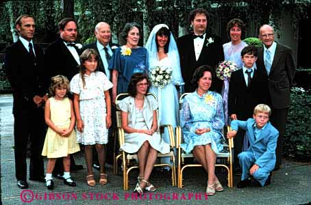 Stock Photo #2762: keywords - affection and bride celebrate children commitment couple family groom group heritage horz husband love man marriage relative released reunion share together vow wedding wife woman