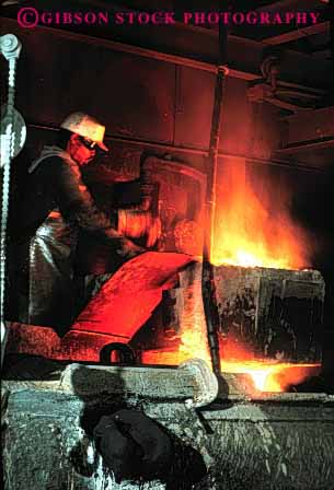 Stock Photo #2766: keywords -  burn checks danger equipment foundry heat hot in industry iron job machine manufacture melt metal molten occupation pour risk safety technology vert worker