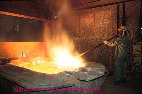 Stock Photo #2769: keywords -  brass burn checks danger equipment foundry heat horz hot in industry job machine manufacture melt metal molten occupation pour risk safety technology worker