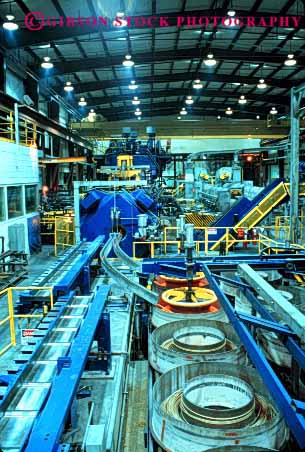 Stock Photo #2772: keywords - brass burn coiling danger equipment factory foundry heat hot industry machine manufacture melt metal risk rod safety technology vert