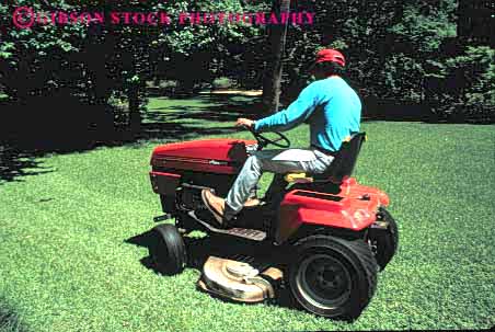 Stock Photo #2776: keywords - cut drive equipment groom grounds hazard horz job landscape lawn machine man mower occupation operator power tractor work
