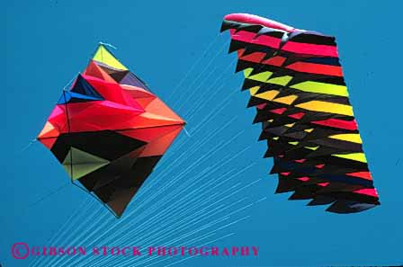 Stock Photo #2796: keywords -  aerodynamic aerodynamics air blow color colorful colors design engineer flight fly flying geometric geometrical geometry horz kite kites lift lifted lifts lightweight material row rows sky soar string style synthetic wind