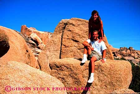 Stock Photo #2804: keywords -  affection california couple desert fun hike horz husband intimate joshua national outdoor park play recreation released rock share summer together tree wife