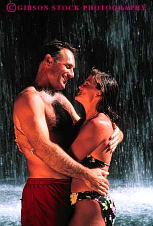 Stock Photo #2806: keywords - affection couple embrace fun hug husband intimate outdoor play recreation released share summer together vert water waterfall wet wife