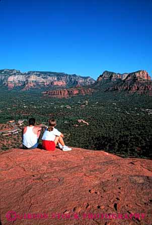 Stock Photo #2809: keywords -  affection alone arizona calm couple elevate fun husband intimate landscape not outdoor overlook overview play private quiet recreation relax released scenic sedona see share sit solitude summer together vert view viewpoint vista wife wilderness