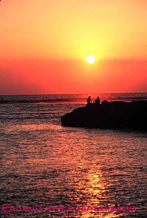 Stock Photo #2815: keywords -  alone calm couple dusk hawaii intimate love ocean orange peaceful quiet romantic share silhouette solitude summer sunset together vacation vert warm water yellow