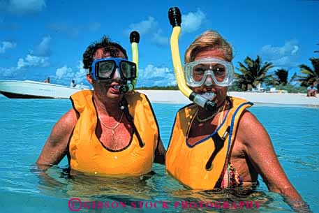 Stock Photo #3449: keywords - caribbean cooperate couple couples dive equipment flotation horz islands outdoor released safety share snorkel sport summer together tropic tropical vacation vest virgin warm water