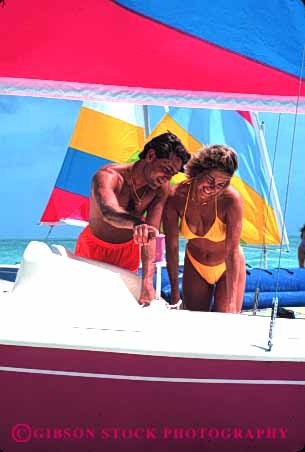 Stock Photo #2818: keywords -  affection beach boat calm colorful couple fun honeymoon husband intimate love ocean play private released sail share solitude summer sun sunshine swim tan together travel vacation vert water wife
