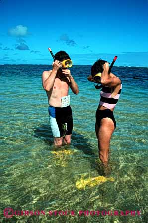 Stock Photo #2824: keywords -  affection beach calm couple fin fun hawaii honeymoon husband intimate love mask ocean play private released shallow share snorkel solitude summer sun sunshine swim tan together travel vacation vert water wife