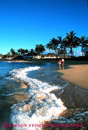 Stock Photo #2825: keywords -  affection alone beach calm couple fun hawaii honeymoon husband intimate love ocean play private quiet sand share solitude stroll summer sun sunshine swim tan together travel vacation vert water wife