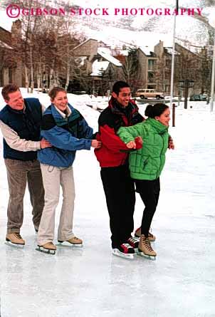 Stock Photo #2828: keywords -  affection coordination couples fun husband ice intimate play released share skating teamwork together vert wife winter