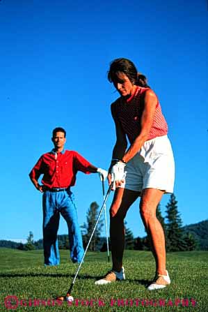 Stock Photo #2834: keywords - affection alone couple fun golf husband intimate play private released share solitude sport summer sun sunshine together travel vacation vert wife