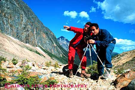 Stock Photo #2846: keywords -  adventure affection alone camera couple ethnic fun horz husband intimate landscape photo photography play private released share solitude summer sun sunshine team together travel wife wilderness