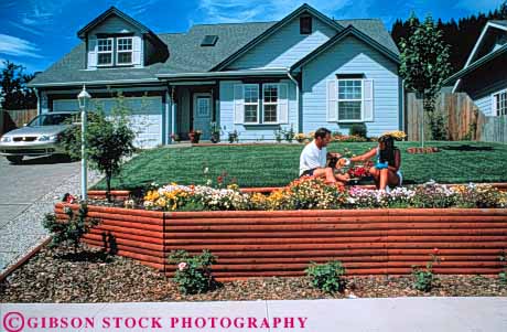 Stock Photo #3455: keywords -  assist couple couples decorate dog estate garden gardening happy home horz house improve joy landscape neighborhood outdoor pet plant property puppy real released share together value