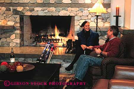 Stock Photo #2863: keywords - affection apre couple cozy fireplace horz husband intimate love refresh relax released resort share ski skiing snow together warm wife winter