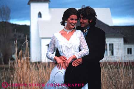 Stock Photo #2866: keywords - affection bride couple dress groom horz hug husband intimate love released share style together wedding western wife