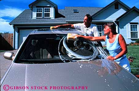 Stock Photo #2867: keywords -  affection car clean couple home horz husband intimate love released residential share suds summer team together wash water wife