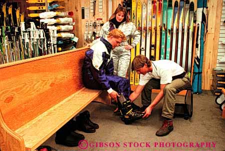 Stock Photo #2878: keywords -  affection boots business buy clothing commerce couple equipment gear horz husband love merchandise released select sell share shop shopping ski skiing snow store style together wife