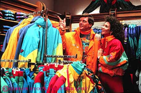 Stock Photo #2879: keywords - affection boots business buy clothing commerce couple equipment gear horz husband love merchandise released select sell share shop shopping ski skiing snow store style together wife