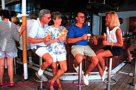 Stock Photo #2880: keywords -  affection alcohol beverage couples drink four friend happy horz husband laugh lounge love released share ship social together travel vacation wife