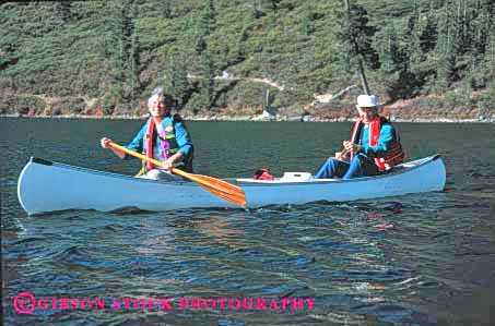 Stock Photo #2883: keywords -  active boat canoe canoeing couple elderly exercise fitness float grandparent health horz husband lake mature paddle recreation released senior share sport team together water wife workout