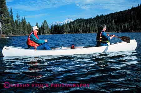 Stock Photo #2884: keywords -  active boat canoe canoeing couple elderly exercise fitness float grandparent health horz husband lake mature paddle recreation released senior share sport team together water wife workout