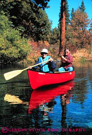 Stock Photo #2885: keywords -  active boat canoe canoeing couple elderly exercise fitness float grandparent health husband lake mature paddle recreation released senior share sport team together vert water wife workout