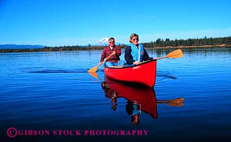 Stock Photo #2887: keywords -  active boat canoe canoeing couple elderly exercise fitness float grandparent health horz husband lake mature paddle recreation released senior share sport team together water wife workout