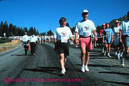 Stock Photo #2891: keywords -  active couple effort elderly exercise fitness grandparent health horz husband mature race recreation released run senior share speed sport team together walk wife workout