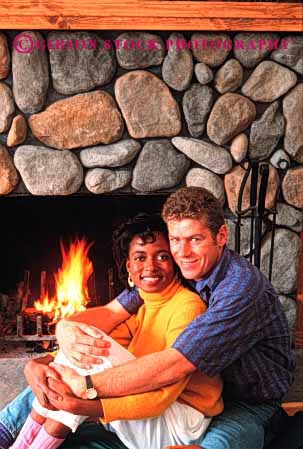 Stock Photo #2897: keywords -  affection african american black caucasian couple ethnic home hug husband interracial intimate love man minority mixed released share together vert wife woman