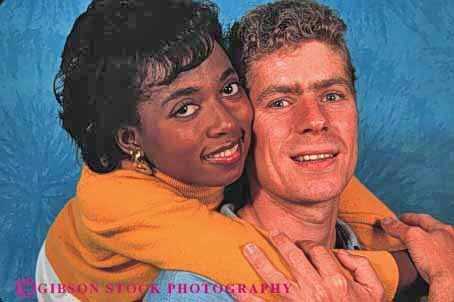 Stock Photo #2900: keywords - affection african american black caucasian couple ethnic home horz hug husband interracial intimate love man minority mixed released share together wife woman