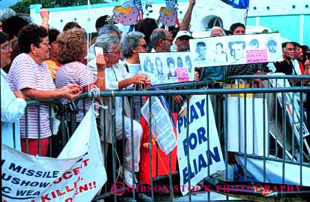 Stock Photo #6171: keywords -  attitude barricade demonstrate demonstrators elian express gonzalez home horz influence miami opinion out outspoken protest public speak together unite united