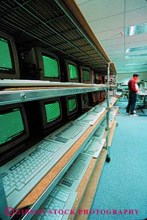 Stock Photo #2930: keywords - assembly computer control factory keyboard laboratory manufacturer monitor quality technology testing vert
