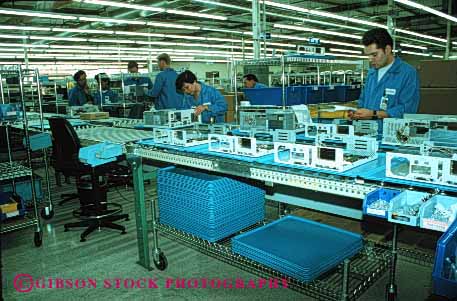 Stock Photo #2935: keywords -  assemble assembly computer control employee factory horz job laboratory line machine manufacturer quality technology work