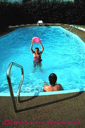 Stock Photo #2960: keywords -  backyard boy brother children girl home play pool private released residential sister swim swimming vert water wet