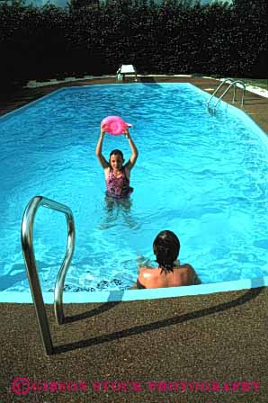 Stock Photo #2960: keywords - backyard boy brother children girl home play pool private released residential sister swim swimming vert water wet