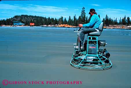 Stock Photo #2967: keywords -  cement concrete construction drive equipment finish float floor glide horz hover industry job labor machine man mechanical moving operate parts polish smooth technology work